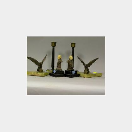 Two Pairs of Art Deco Bookends and a Pair of Brass Mounted Bakelite Candlesticks