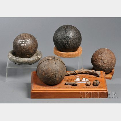 Four Excavated Iron Cannonballs