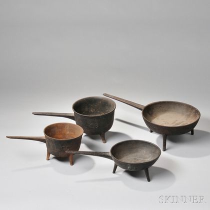 Two Cast Iron Footed Skillets and Two Cast Iron Posnets