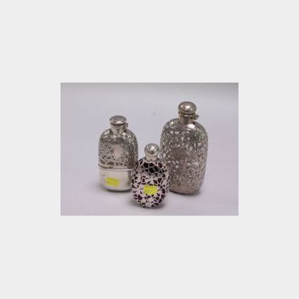 Three Sterling Silver Mounted Glass Liquor Flasks. 