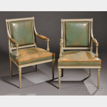 Pair of Louis XVI-style Painted and Leather-upholstered Fauteuils