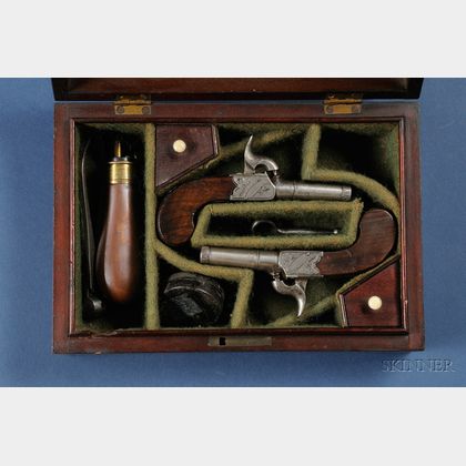 Cased Pair of Percussion Pocket Pistols by Patrick