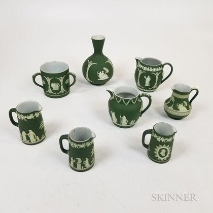 Eight Wedgwood Olive Green Vessels