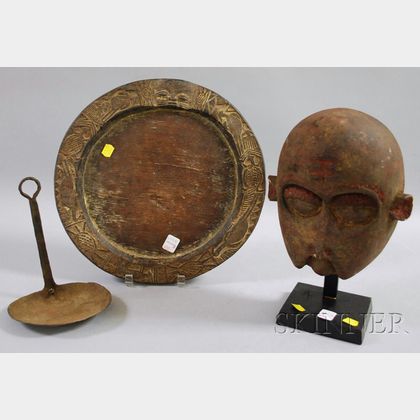 Yorubi Divination Tray, Iron Hand-forged Lamp, and an Ancestor Mask. 