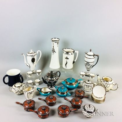 Thirty-two Silver Overlay Ceramic Tableware Items. Estimate $200-400