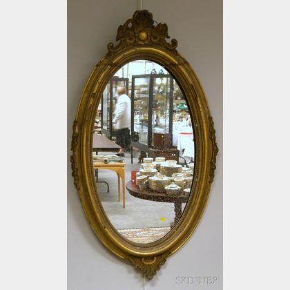 Victorian Oval Rococo Revival Giltwood and Gesso Mirror