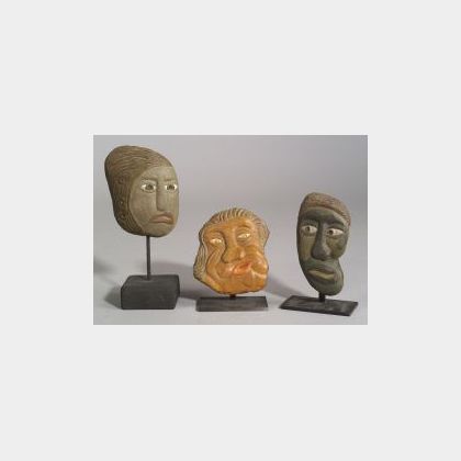 Three Polychrome Painted Carved Stone Heads