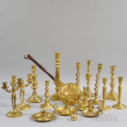 Fifteen Brass Candlesticks and Chambersticks and a Small Brass Bedwarmer. Estimate $20-200