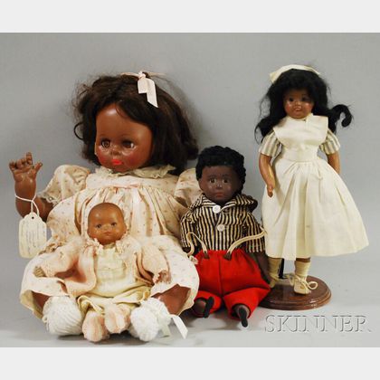 Four Miscellaneous Brown Dolls