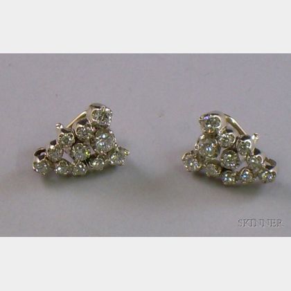 14kt White Gold and Diamond Earclips. 