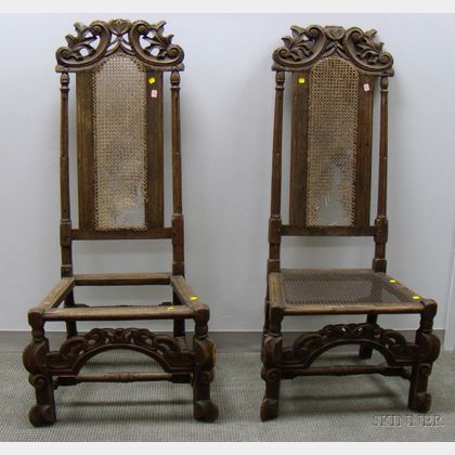 Pair of Jacobean-style Carved Oak and Caned Hall Chairs. 