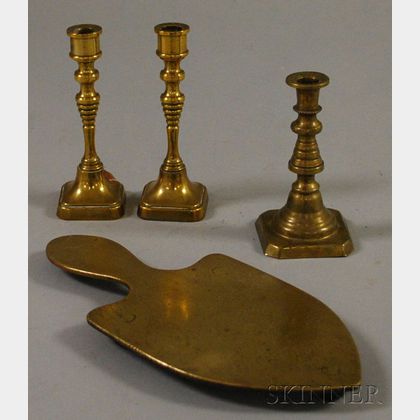 Three Miniature Brass Candlesticks and a Trivet