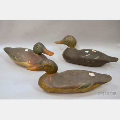 Set of Three Carved and Painted Wooden Working Duck Decoys. 
