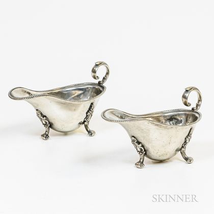 Pair of Pewter Footed Sauceboats and Six Pewter Pap Boats