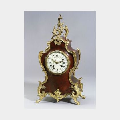 French Louis XV-style Faux Tortoiseshell and Ormolu Mounted Mantel Clock