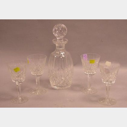 Waterford Colorless Cut Glass Decanter and Four Wine Glass Set. 