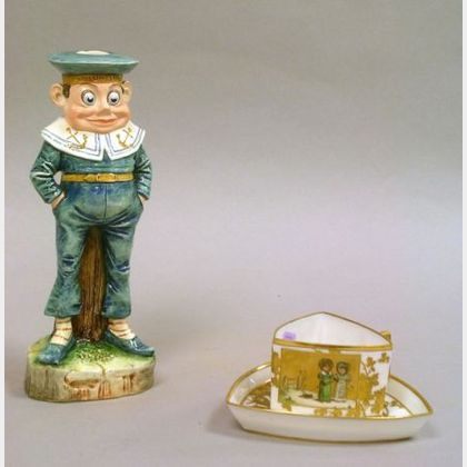 Kate Greenaway/Limoges Gilt Enamel Decorated Triangular Porcelain Cup and Saucer, and a Glazed Ceramic Palmer Cox Brownie Sailor Figu 