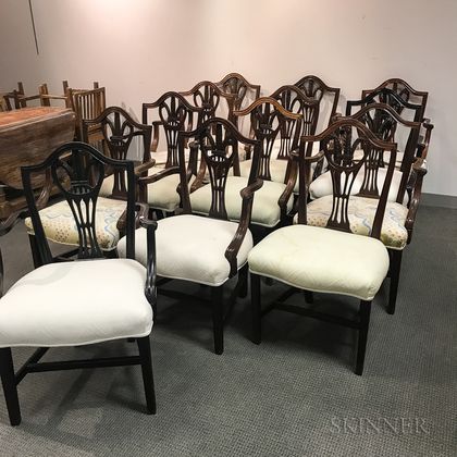 Thirteen George III-style Carved Mahogany Dining Chairs. Estimate $20-200