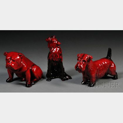 Three Royal Doulton Flambe Dogs