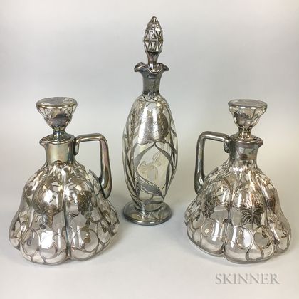 Three Silver Overlay Colorless Glass Decanters