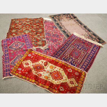 Five Small Oriental Rugs and a Machine-made Rug