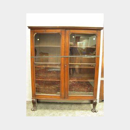 Classical Revival Glazed Carved Mahogany Two-Door Book Cabinet. 