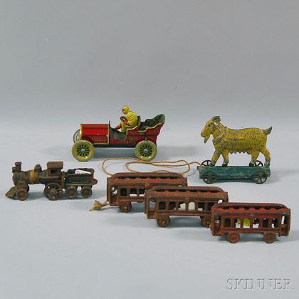 Four-piece Cast Iron Train, Tin Friction Roadster, and Goat on Wheels Pull-toy