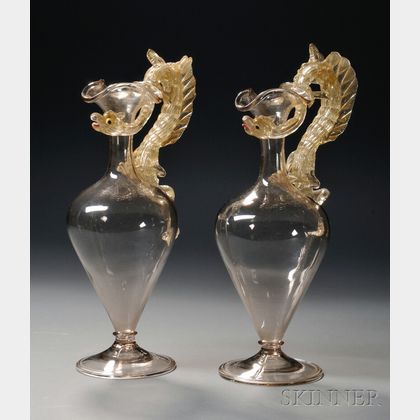 Pair of Venetian Colorless Blown and Gold Fleck Art Glass Ewers with Dragon-form Handles