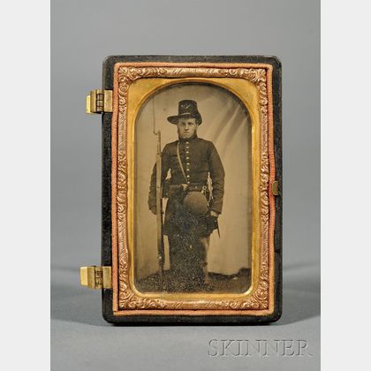 Cased Ambrotype of a Union Civil War Soldier with Musket and Two Photographs