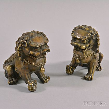 Pair of Bronzed Metal Foo Lion Figures