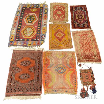 Eight Small Rugs