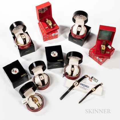 Nine Seiko Mickey Mouse Watches with Boxes and Papers. Estimate $200-400
