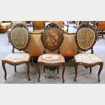 Set of Five Victorian Rococo Revival Needlepoint Upholstered Carved Walnut and Rosewood Veneer Parlor Side Chairs. 