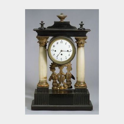 Biedermeier Ebonized, Parcel Gilt and Onyx Mounted Musical Mantel Clock