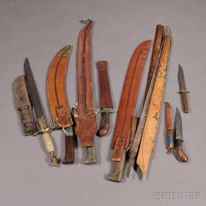 Group of Three Machetes, Six Knives, and a Blade