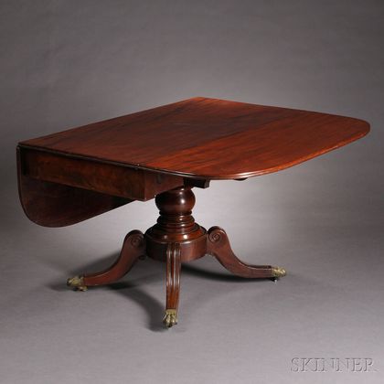 Classical Carved Mahogany and Mahogany Veneer Drop-leaf Table
