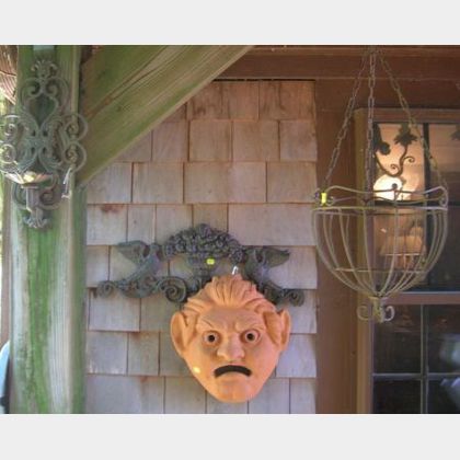 Group of Assorted Decorative Metal Wall Hooks, Sconces, a Hanging Basket, and Two Terra-cotta Garden Wall Masks. 