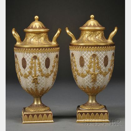 Pair of Wedgwood Gilded and Bronzed Queen's Ware Vases and Covers
