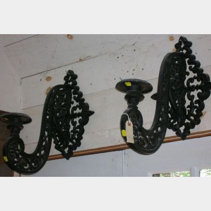 Pair of Large Black Painted Cast Iron Wall Candle Sconces and a Pair of Black Painted Cast Iron Wall Hooks.