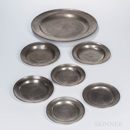 Six American Pewter Plates and a Charger
