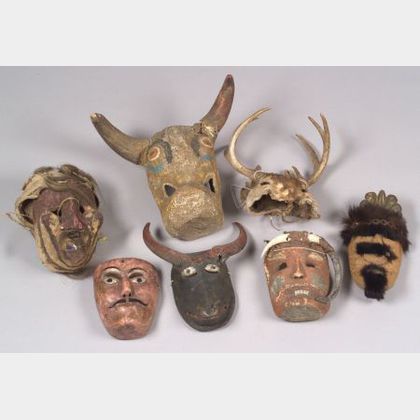 Seven Carved Wood Mexican Masks