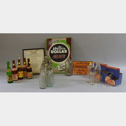 Collection of Clinton, Massachusetts Soda and Beverage Bottles, Crates, and Advertising Signs