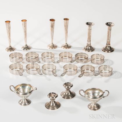 Group of Sterling Silver Weighted Bud Vases, Weighted Low Candlesticks, and Reticulated Sleeves