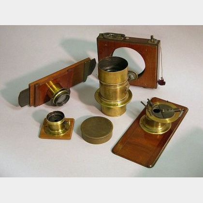 Four Brass-Bound Lenses and a Shutter