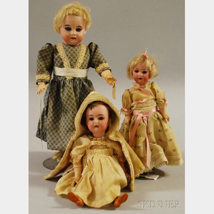 Three Small Bisque Head Dolls