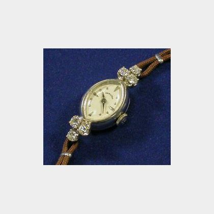 Lady&#39;s 14kt Gold and Diamond Wristwatch