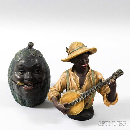 Polychrome Plaster Figural Tobacco Jar and a Banjo Player