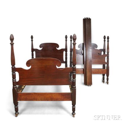 Pair of Federal-style Carved Mahogany Twin Poster Beds. Estimate $100-200