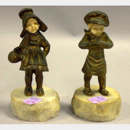 Pair of Gilt Cast Metal and Resin Dutch Boy and Girl Figures