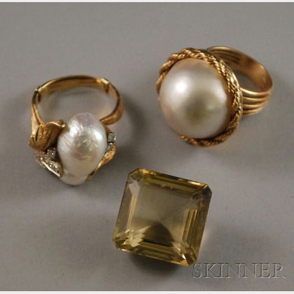 Two 14kt Gold and Pearl Rings and an Unmounted Yellow Stone
